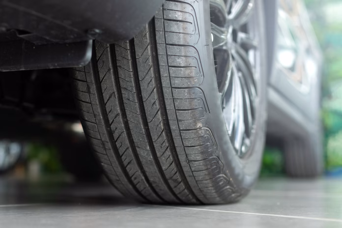 A car tyre tread, highlighting the importance of inspecting wheels and tyre condition before travel. Emphasizes road safety and vehicle readiness for the journey ahead Learn how to spot dangerous tyre wear, identify sidewall damage and protect your vehicle with simple safety checks